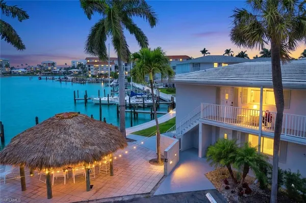 a view of a backyard and a patio