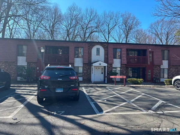 a car parked in front of a house