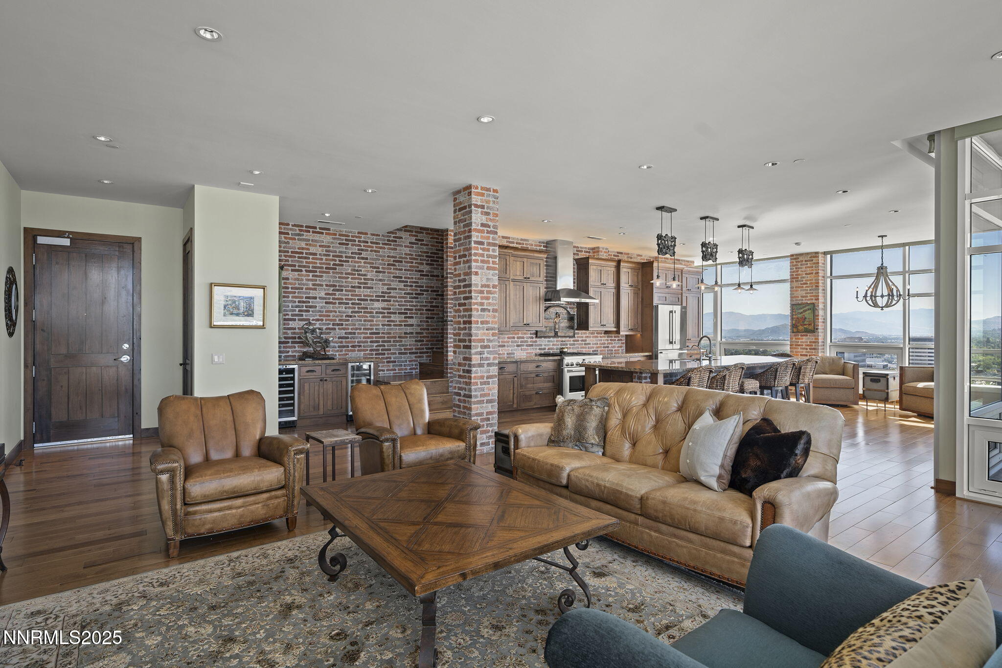 255 North Sierra Street, Unit 2303 Reno, NV 89501 - Photo 11 of 58 a living room with furniture and a couch