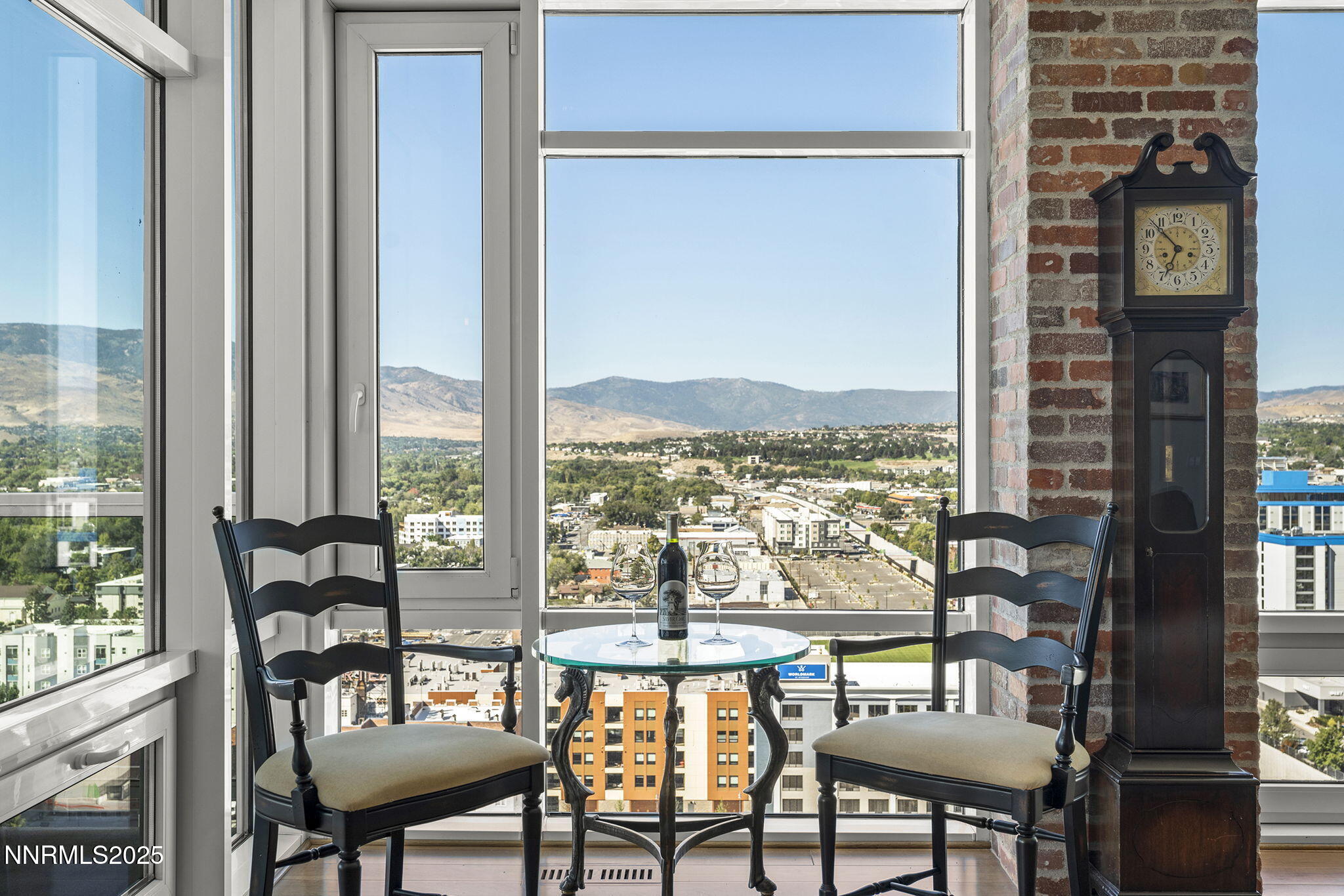 255 North Sierra Street, Unit 2303 Reno, NV 89501 - Photo 12 of 58 a view of a chairs and table in a balcony