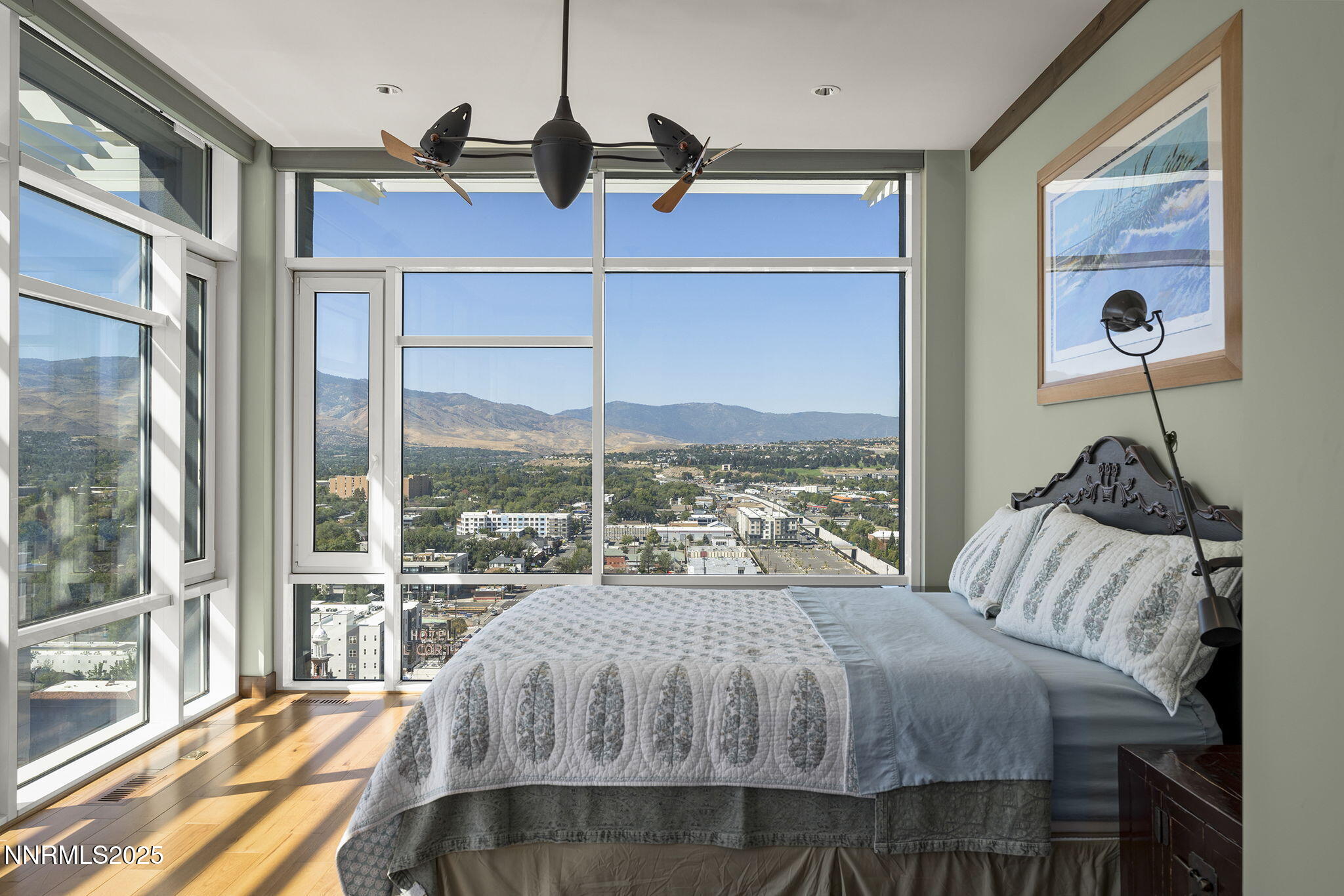 255 North Sierra Street, Unit 2303 Reno, NV 89501 - Photo 16 of 58 a bedroom with a bed and a window