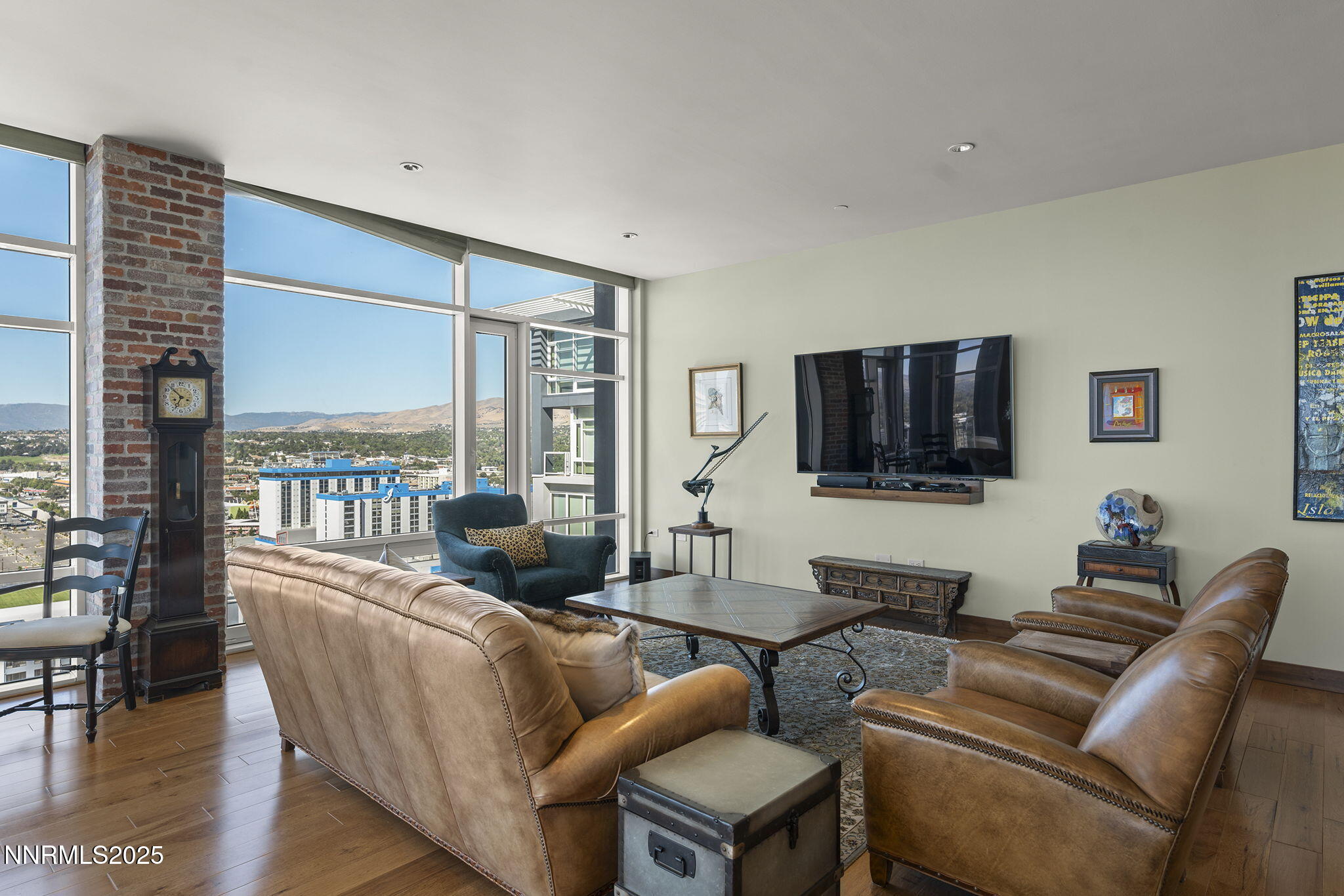 255 North Sierra Street, Unit 2303 Reno, NV 89501 - Photo 17 of 58 a living room with furniture and a flat screen tv