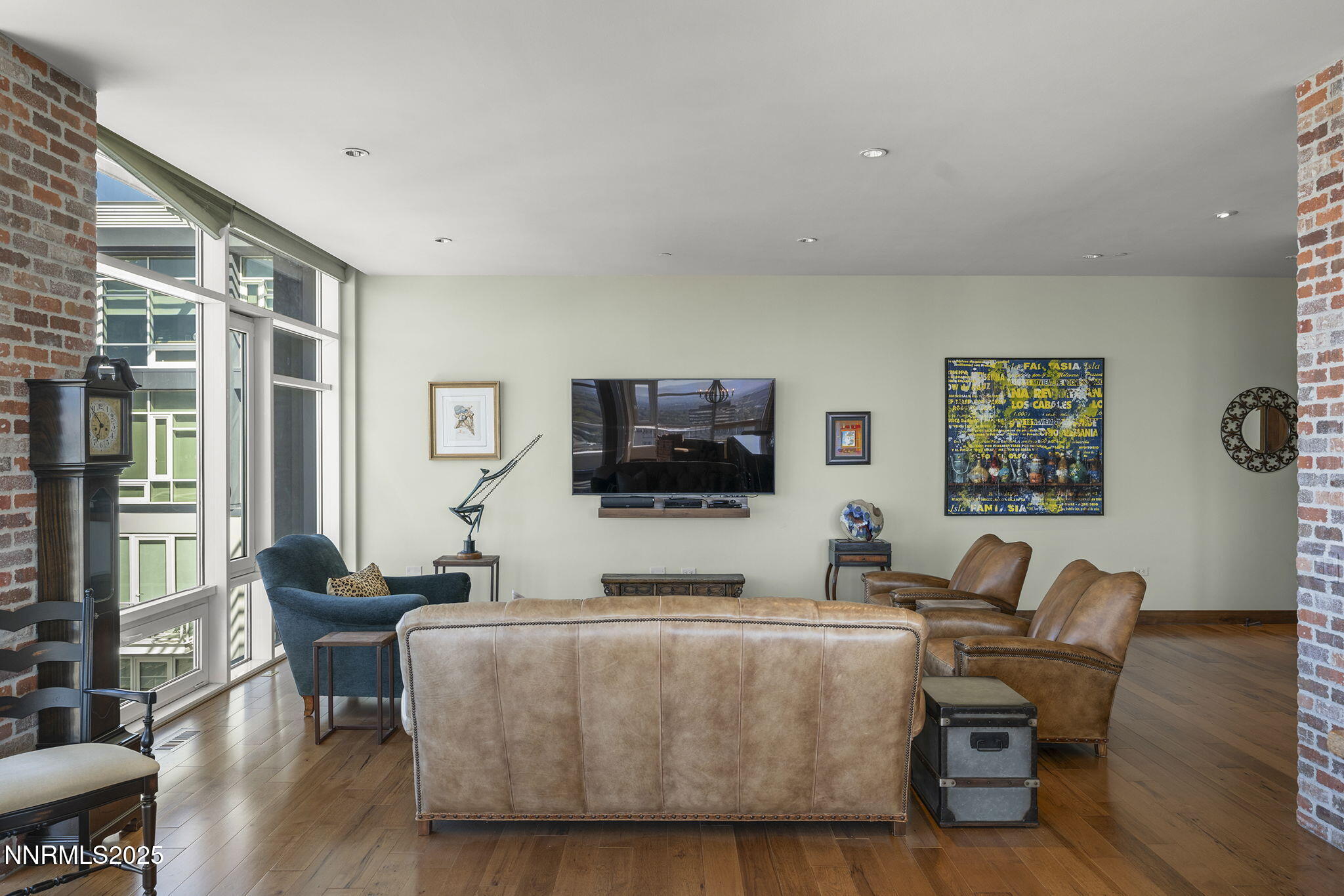 255 North Sierra Street, Unit 2303 Reno, NV 89501 - Photo 18 of 58 a living room with furniture and a flat screen tv