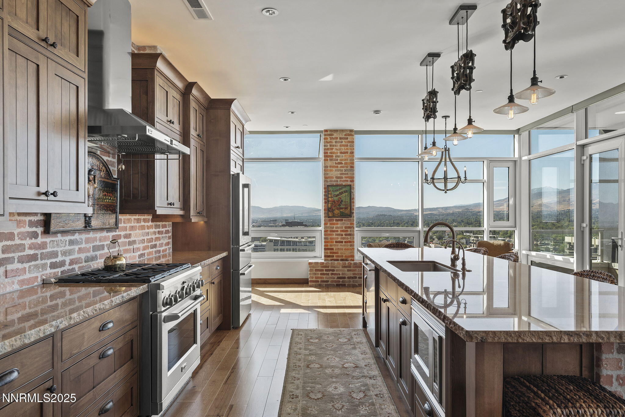 255 North Sierra Street, Unit 2303 Reno, NV 89501 - Photo 23 of 58 a bathroom with a double vanity sink and a bathtub