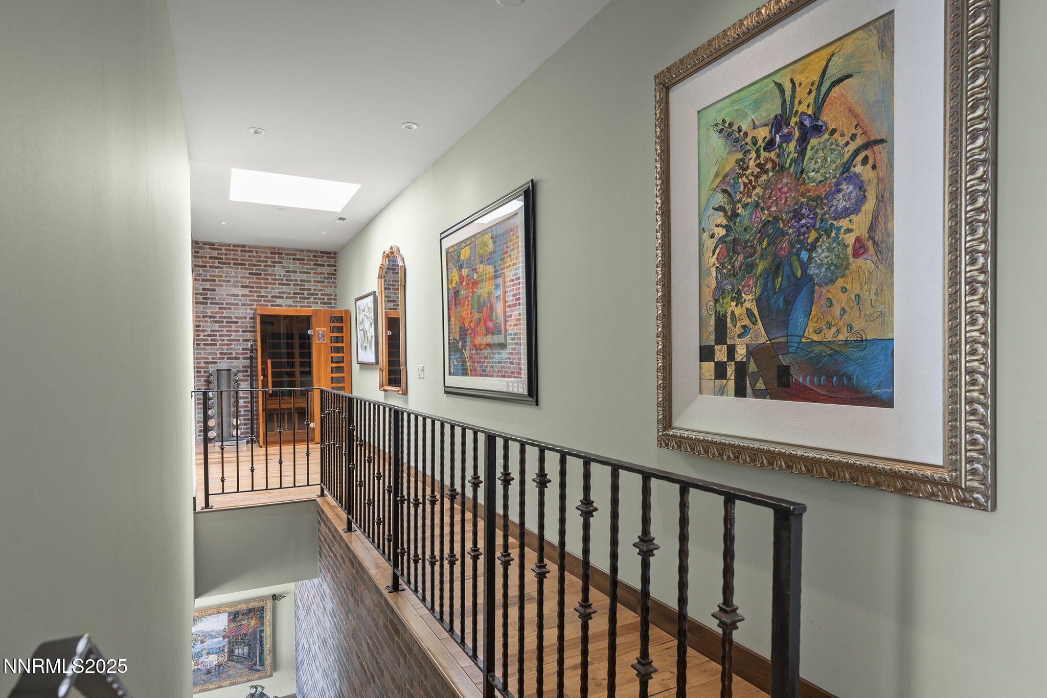 255 North Sierra Street, Unit 2303 Reno, NV 89501 - Photo 30 of 58 a view of a hallway with wooden floor and windows