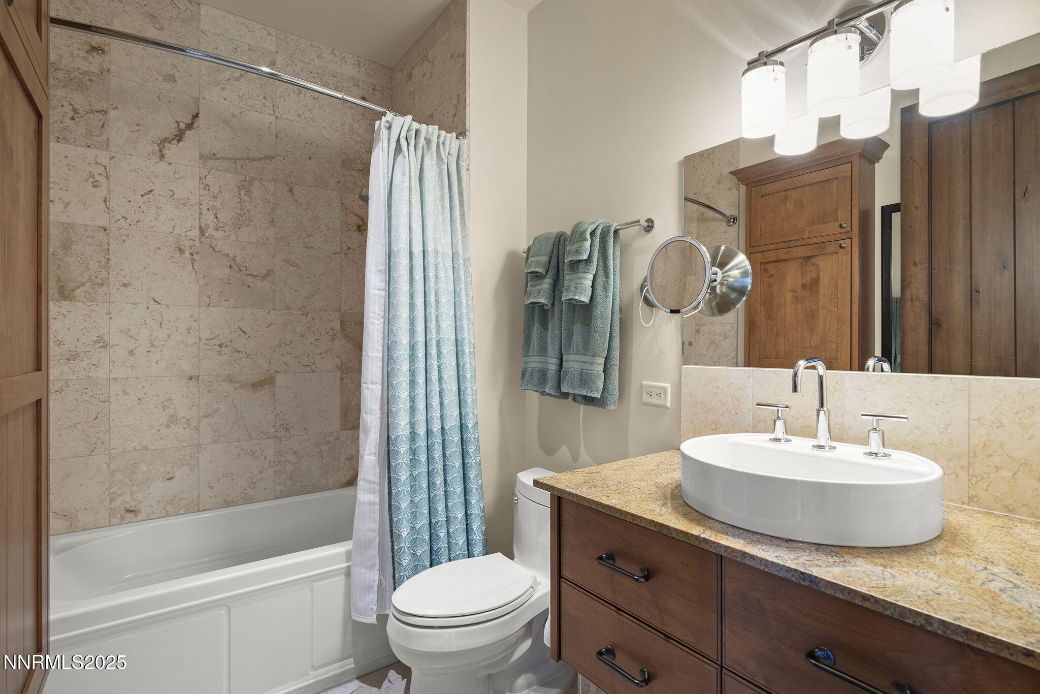 255 North Sierra Street, Unit 2303 Reno, NV 89501 - Photo 35 of 58 a bathroom with a sink toilet and shower