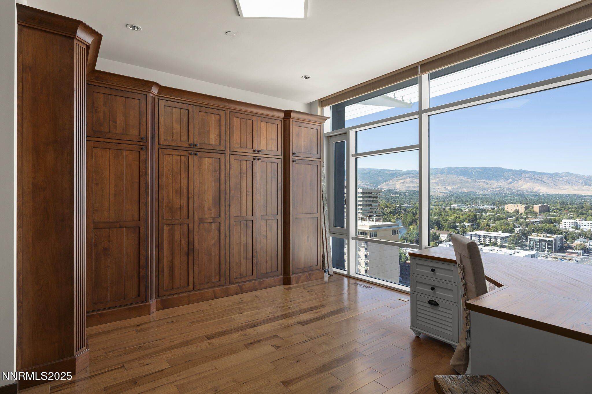 255 North Sierra Street, Unit 2303 Reno, NV 89501 - Photo 43 of 58 a view of a livingroom with furniture window and wooden floor