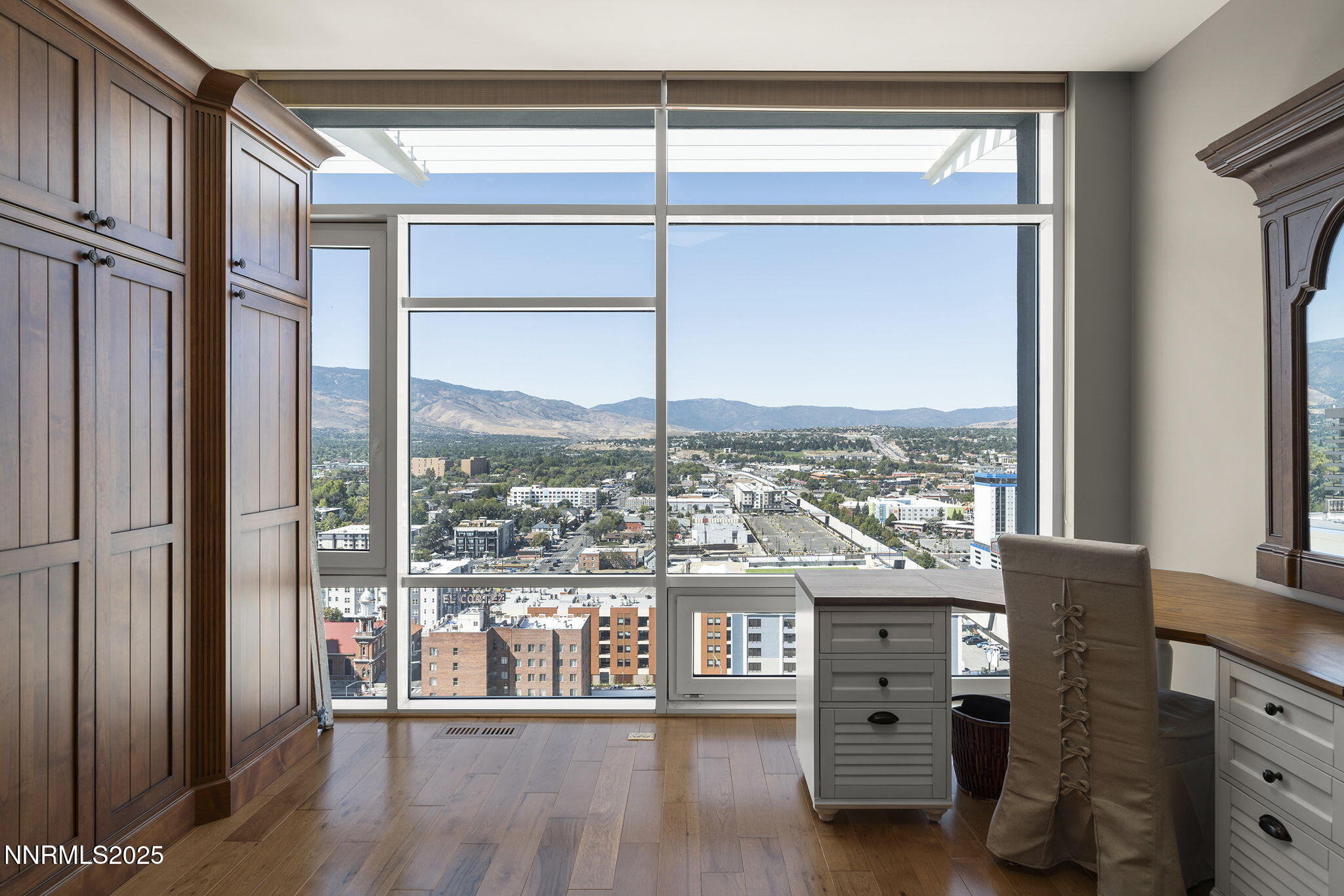 255 North Sierra Street, Unit 2303 Reno, NV 89501 - Photo 44 of 58 a view of a floor to ceiling window and a kitchen