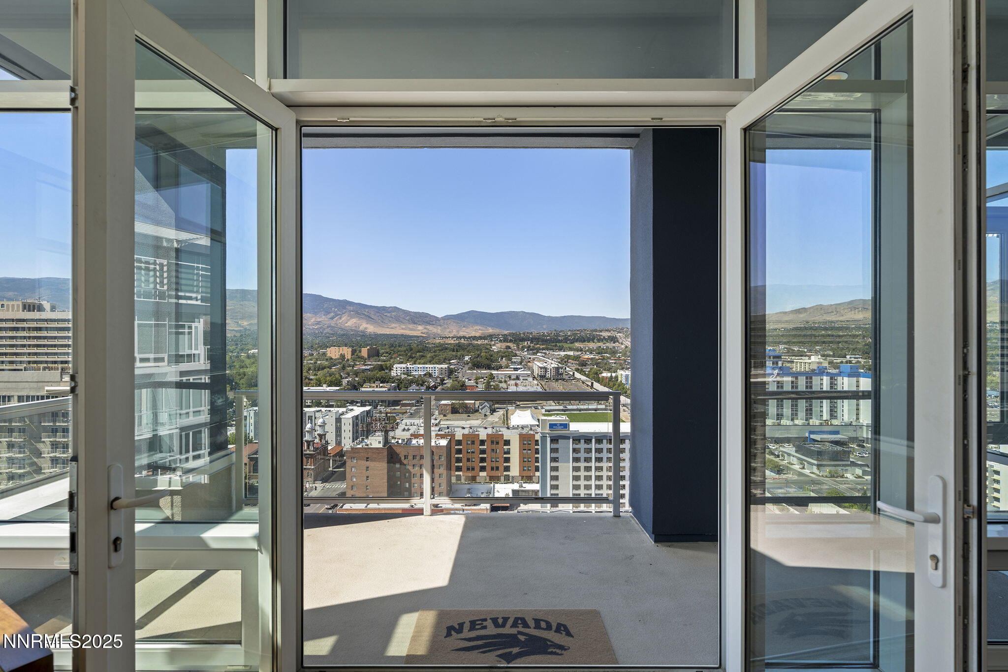 255 North Sierra Street, Unit 2303 Reno, NV 89501 - Photo 45 of 58 a view of a glass door and a balcony