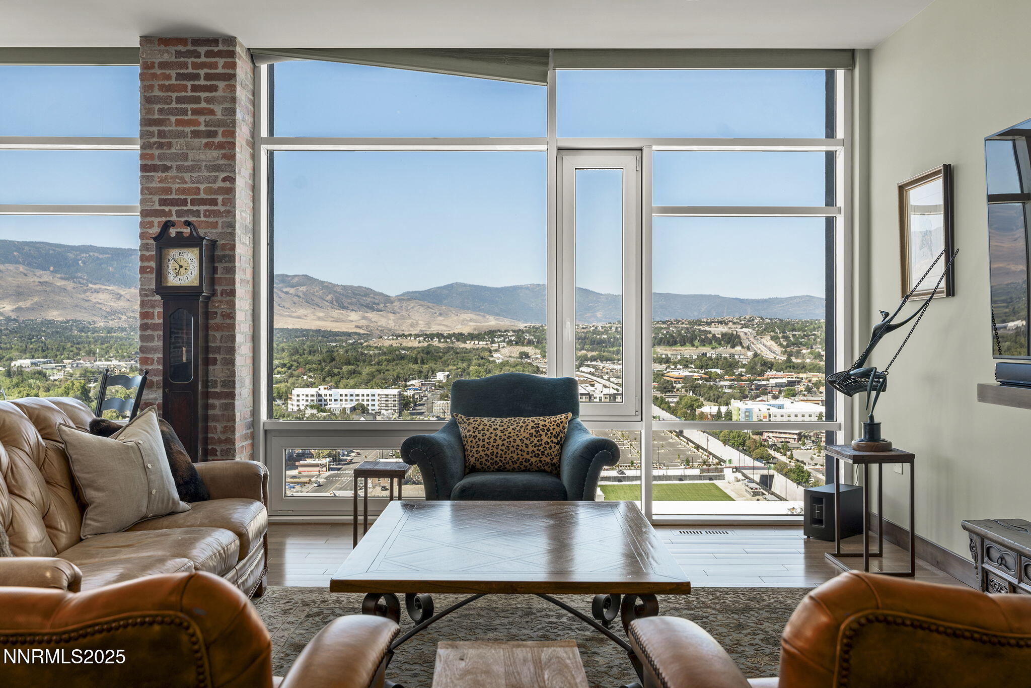 255 North Sierra Street, Unit 2303 Reno, NV 89501 - Photo 9 of 58 a living room with furniture and a large window