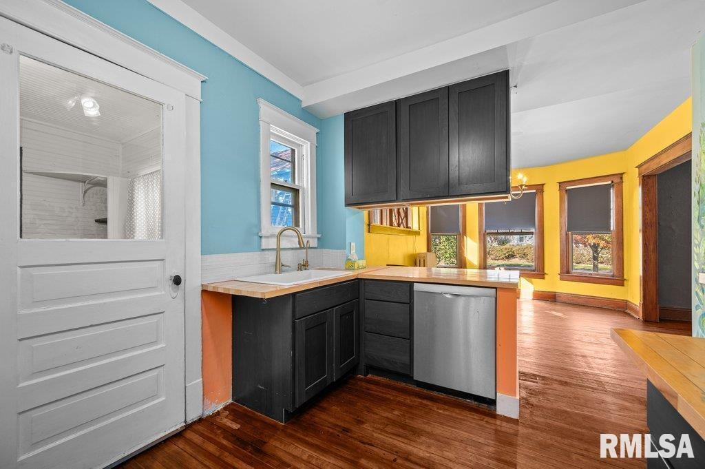 2105 15th Street Moline, IL 61265 - Photo 14 of 29 a kitchen with a sink and cabinets