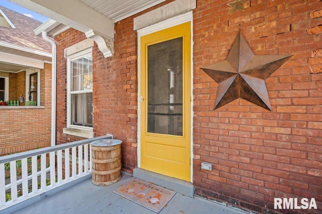 2105 15th Street Moline, IL 61265 - Photo 2 of 29 a view of front door of house with wooden floor