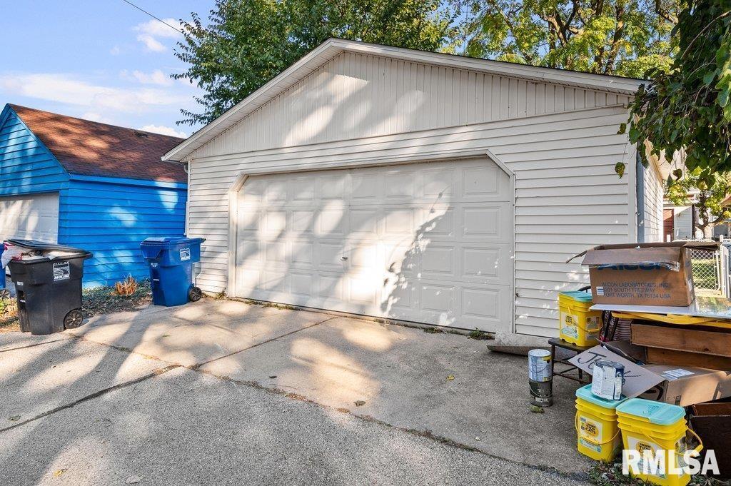 2105 15th Street Moline, IL 61265 - Photo 29 of 29 a backyard of a house with seating space