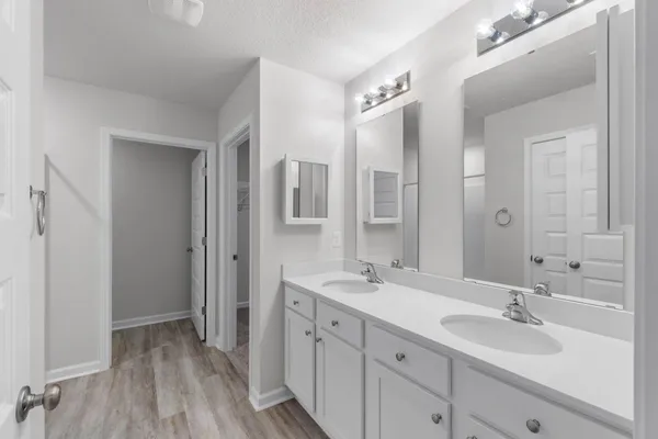 a bathroom with a shower and toilet