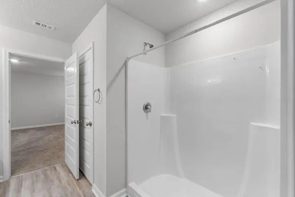 a view of a room with racks on the wall