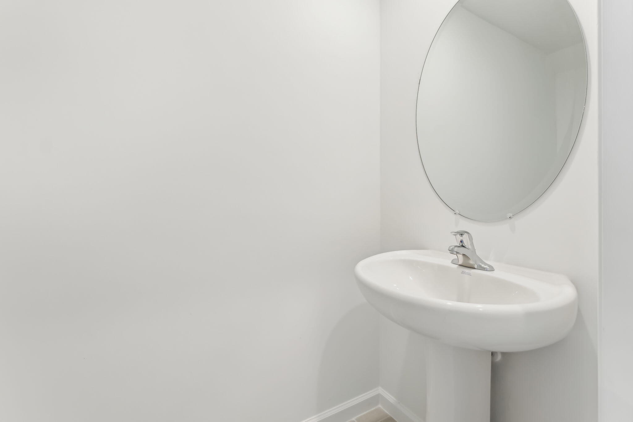 676 Salisbury Circle Fort Pierce, FL 34982 - Photo 15 of 31 a bathroom with a sink and a mirror