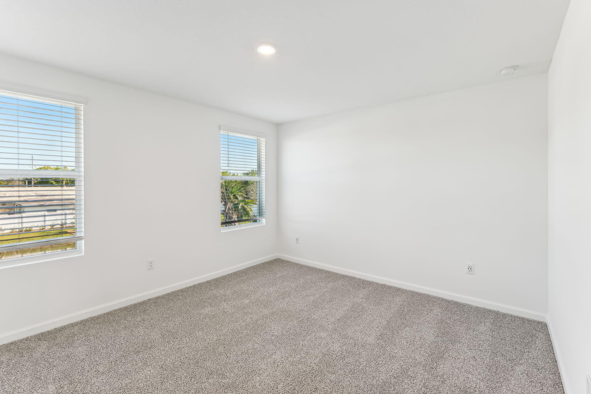 676 Salisbury Circle Fort Pierce, FL 34982 - Photo 16 of 31 an empty room with windows