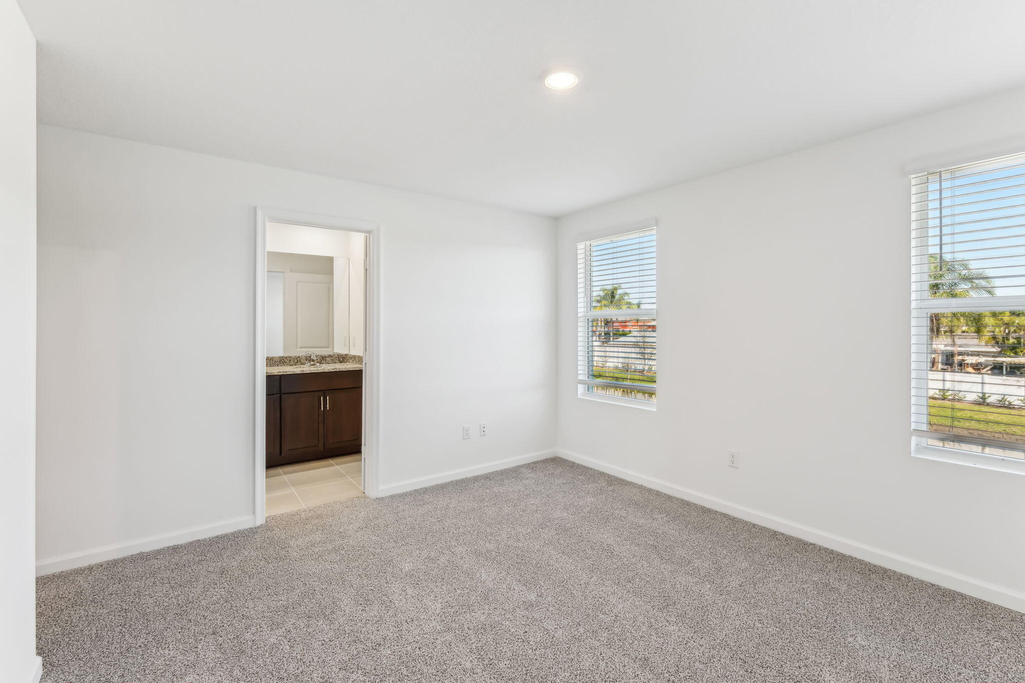 676 Salisbury Circle Fort Pierce, FL 34982 - Photo 18 of 31 an empty room with windows
