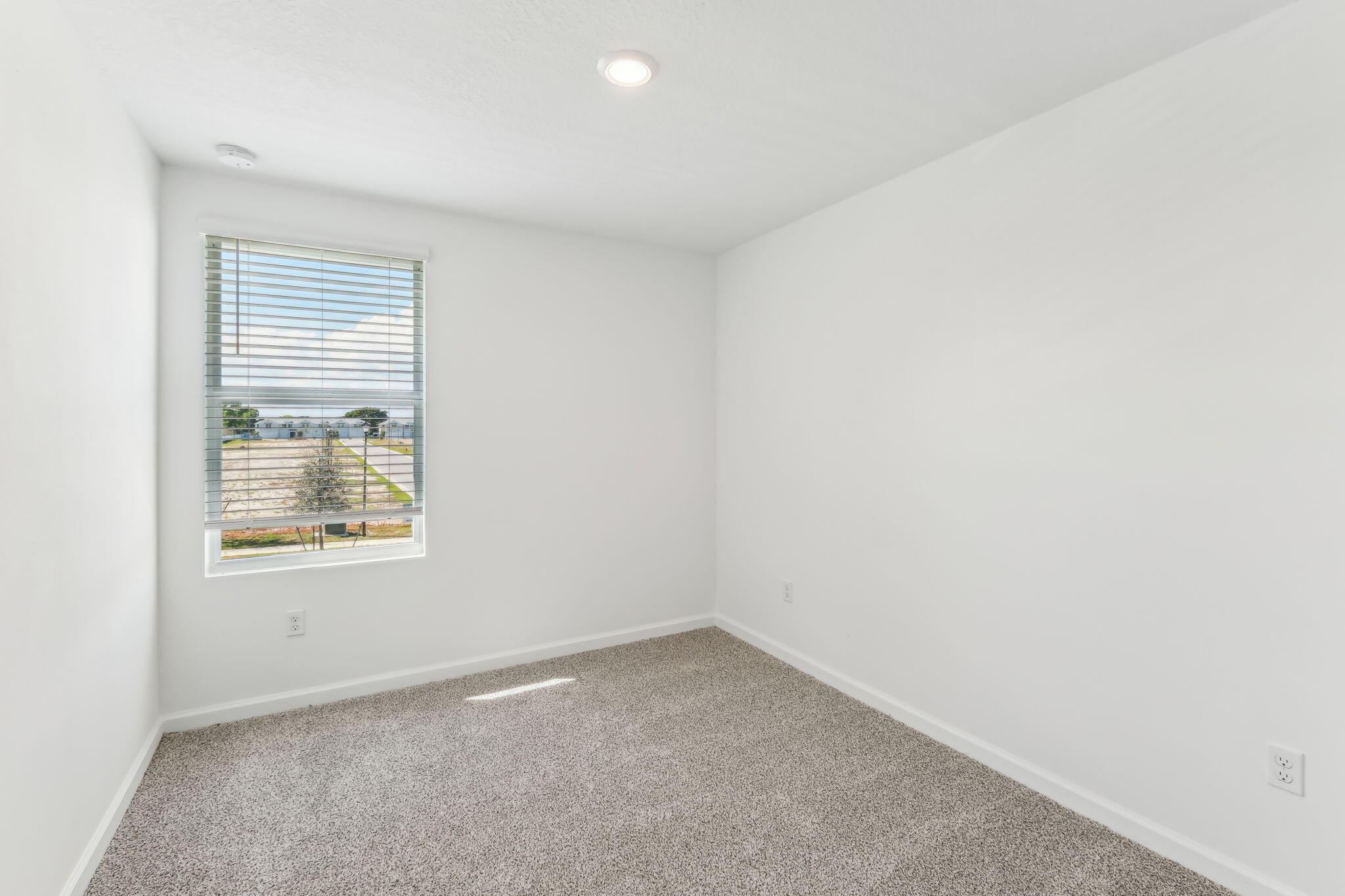 676 Salisbury Circle Fort Pierce, FL 34982 - Photo 22 of 31 an empty room with a window