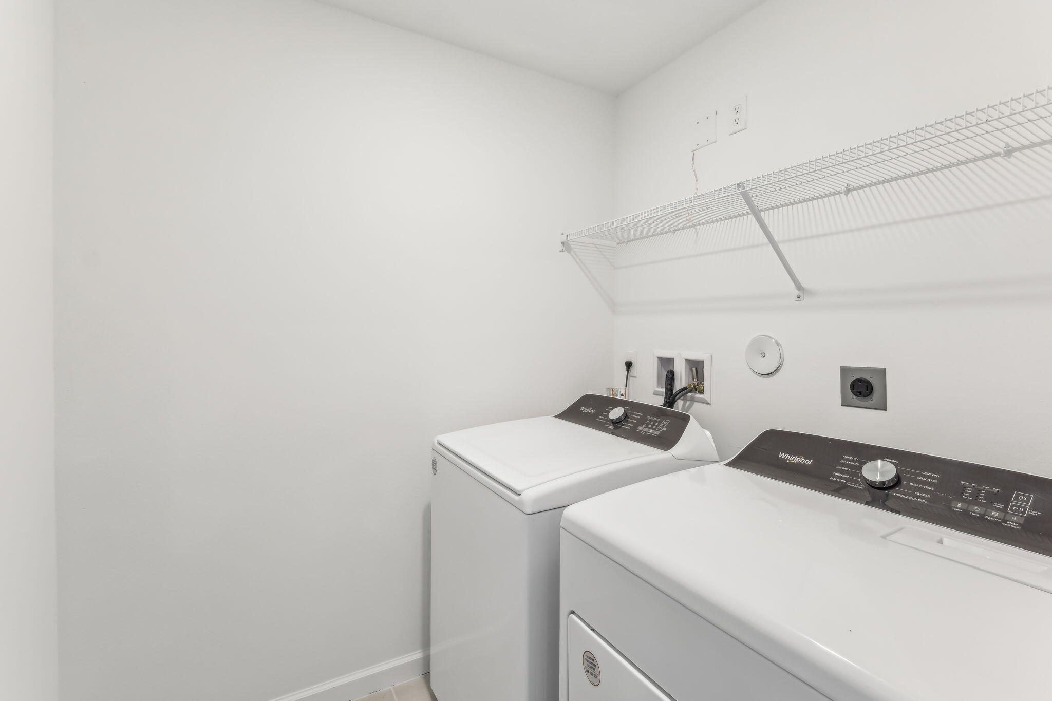 676 Salisbury Circle Fort Pierce, FL 34982 - Photo 27 of 31 a utility room with dryer and washer