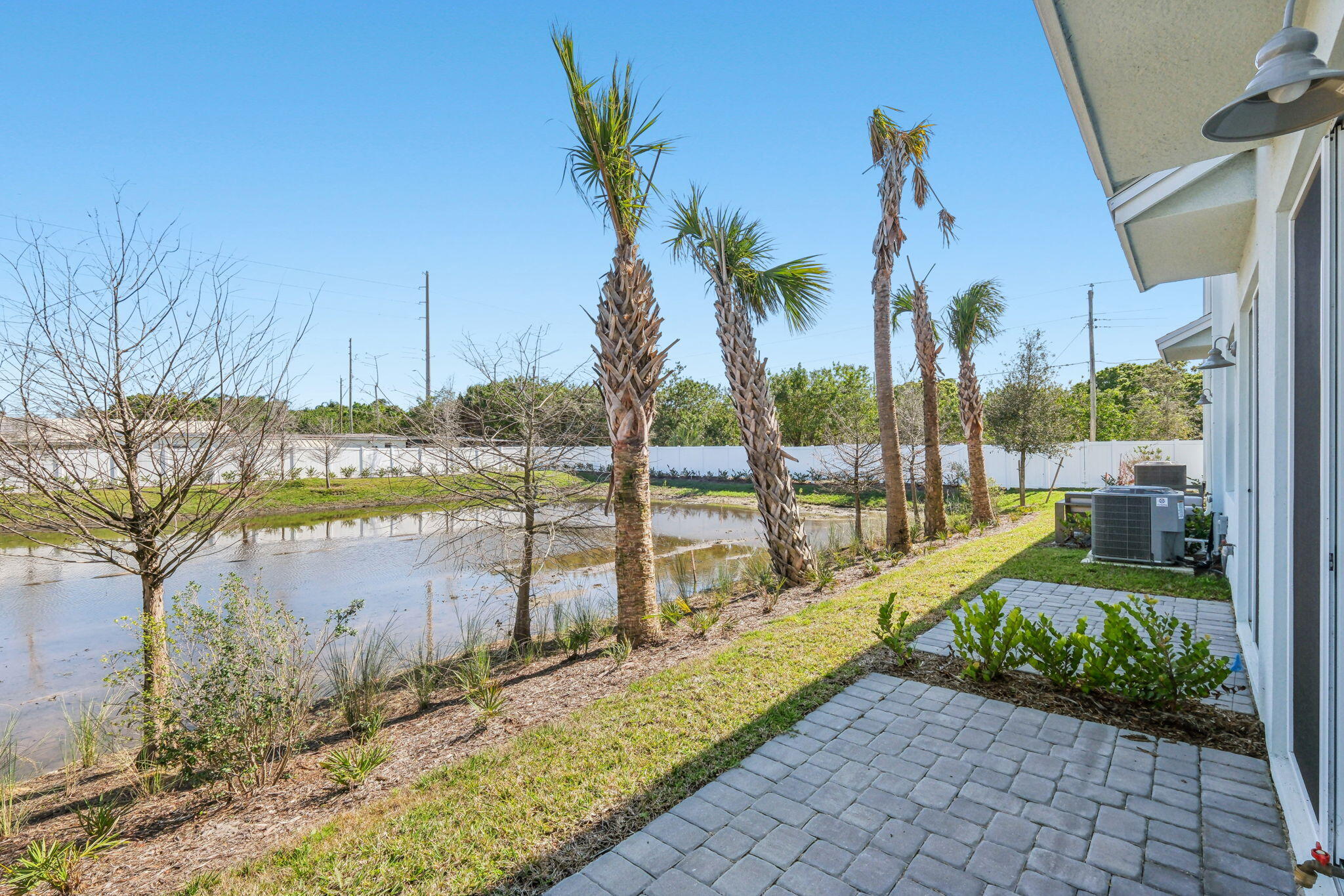 676 Salisbury Circle Fort Pierce, FL 34982 - Photo 28 of 31 a view of a terrace with a garden