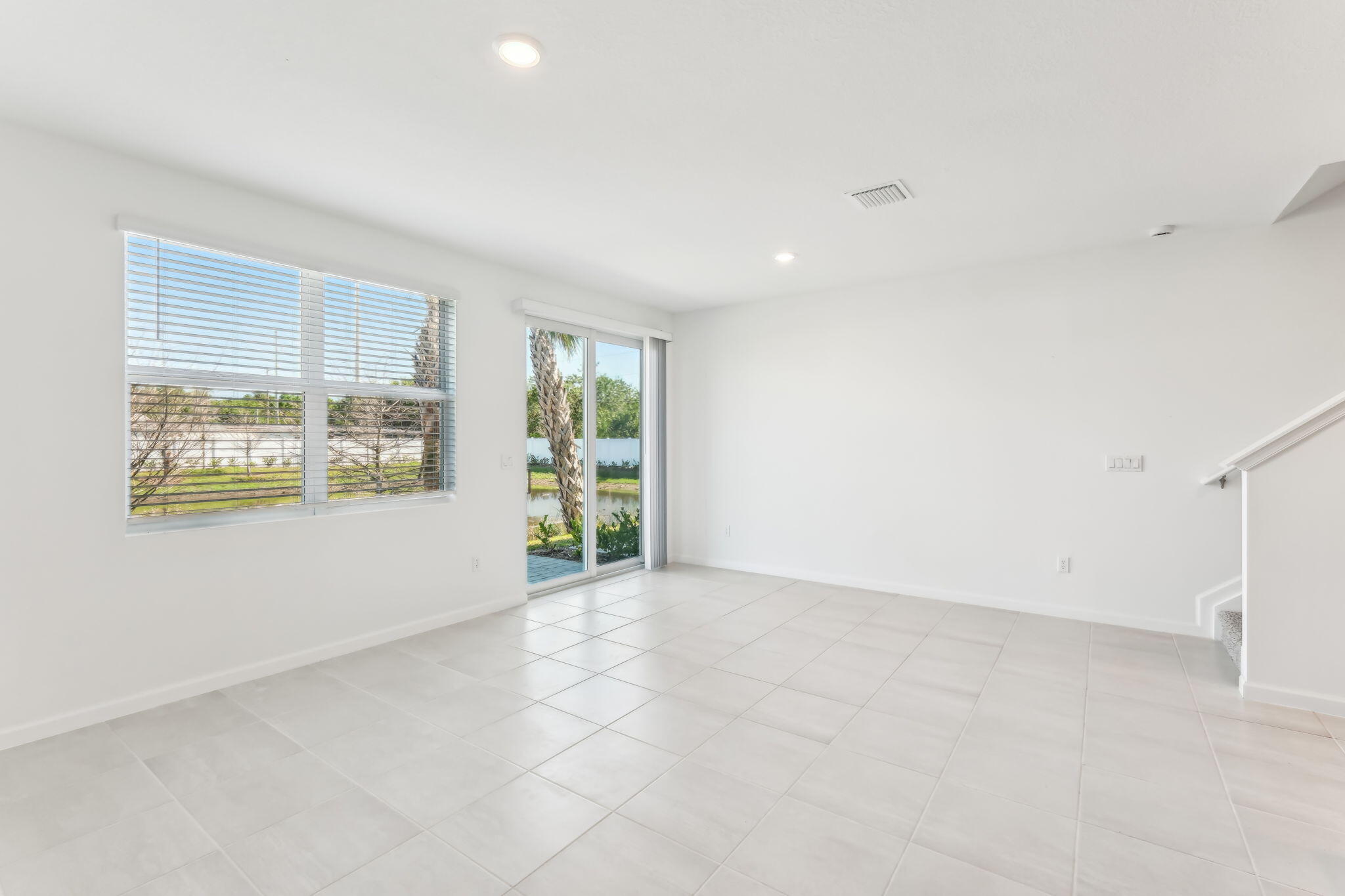 676 Salisbury Circle Fort Pierce, FL 34982 - Photo 10 of 31 an empty room with windows