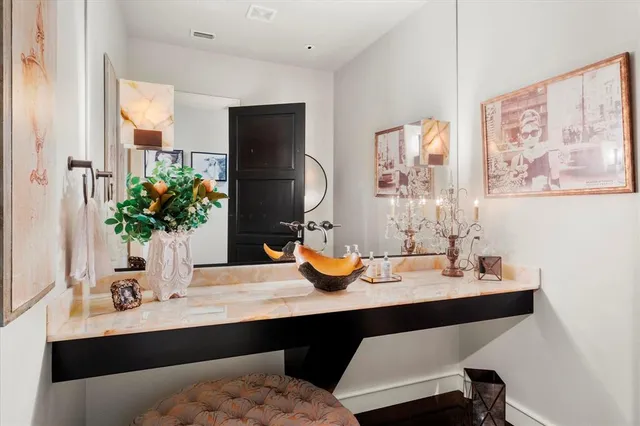 a dining room with table and chairs