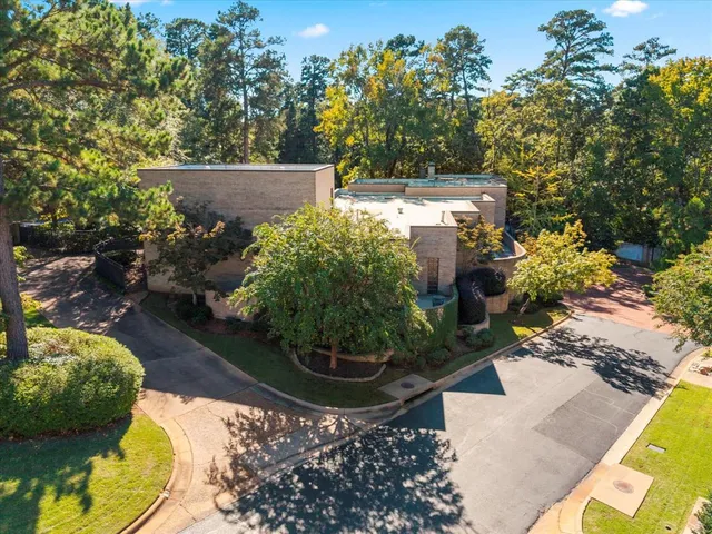 a view of a back yard of the house and swimming pool