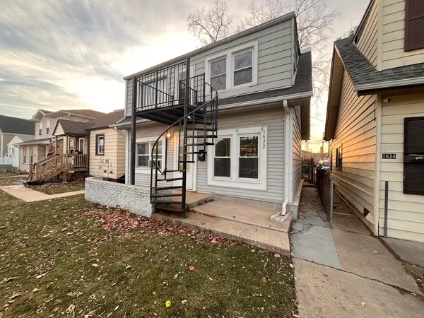 a view of a house with a patio