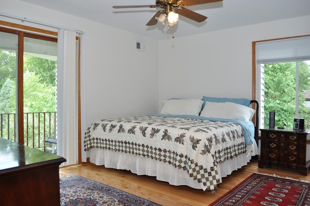 238 Blackhawk Road Riverside, IL 60546 - Photo 8 of 24 a bedroom with a bed and a window