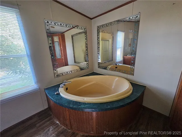 a dining room with table and chairs