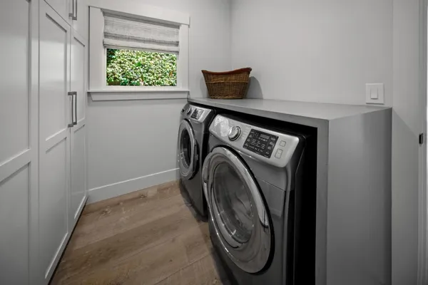 a utility room with dryer and washer