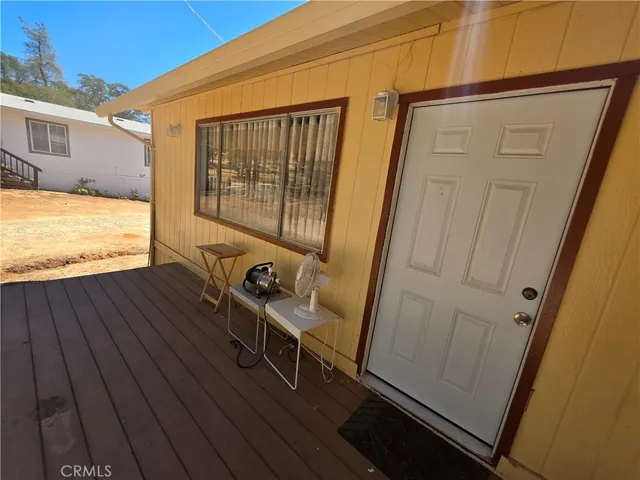 a view of an outdoor space and wooden floor