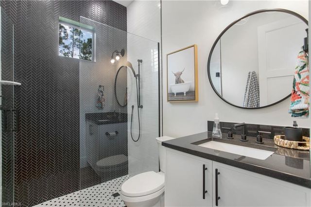 a living room with furniture and windows