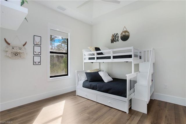 a view of livingroom with furniture wooden floor and window
