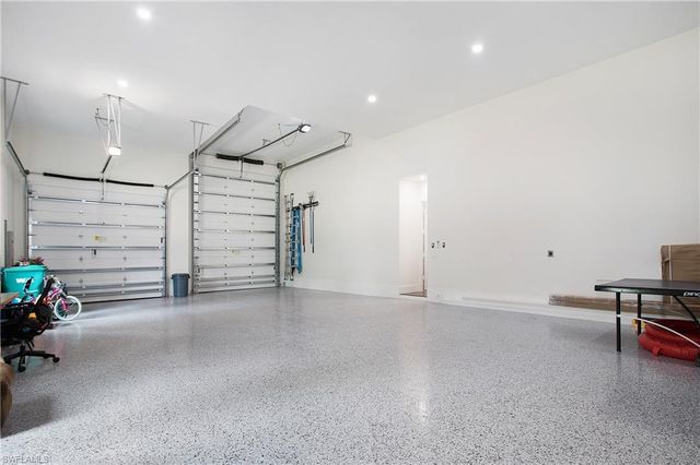 a view of a livingroom with furniture and a ceiling fan