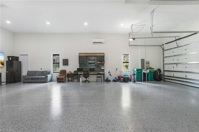 a view of a livingroom with furniture window and outside view