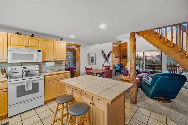 a kitchen that has a cabinets and a stove