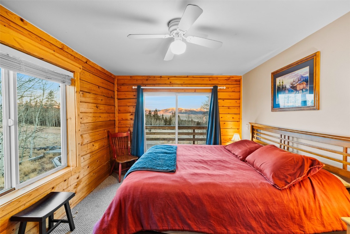 1026 Warpath Road Como, CO 80456 - Photo 15 of 45 a bedroom with a bed and a window