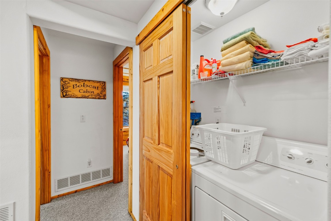 1026 Warpath Road Como, CO 80456 - Photo 26 of 45 a utility room with dryer and washer