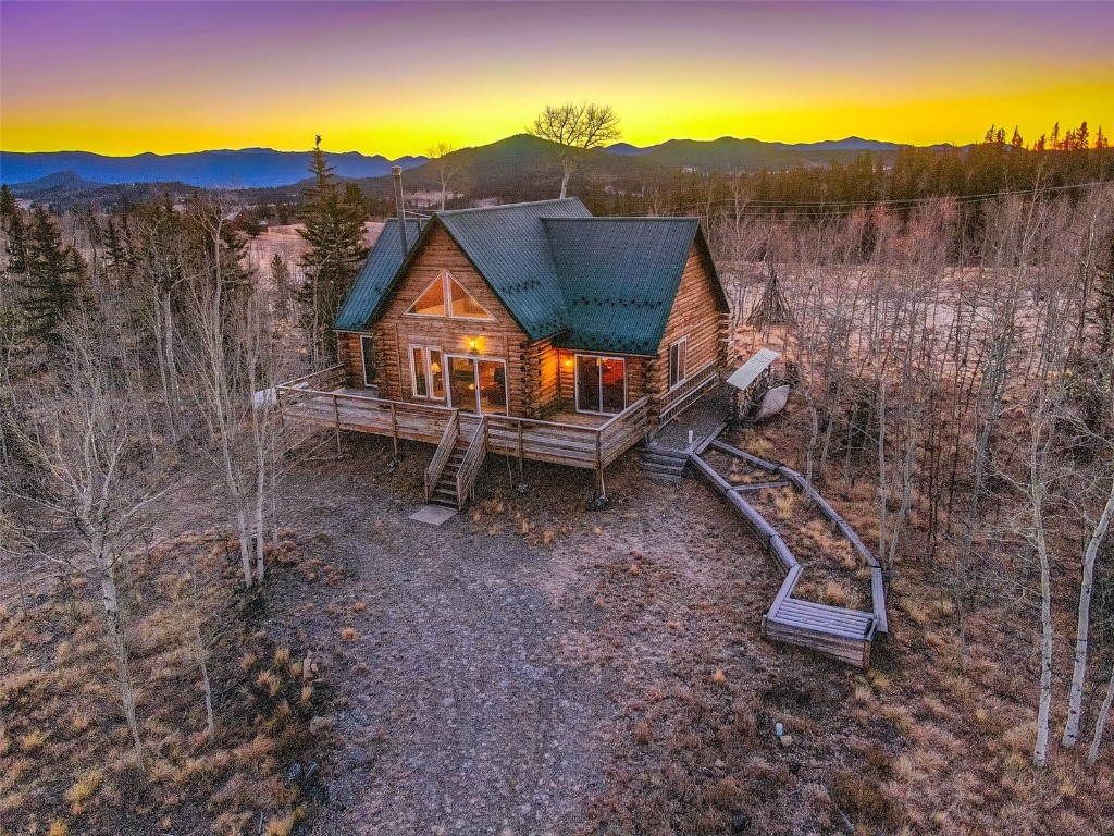 1026 Warpath Road Como, CO 80456 - Photo 33 of 45 a backyard of a house with lots of green space