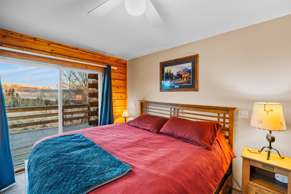 1026 Warpath Road Como, CO 80456 - Photo 4 of 45 a bedroom with a bed and wooden floor