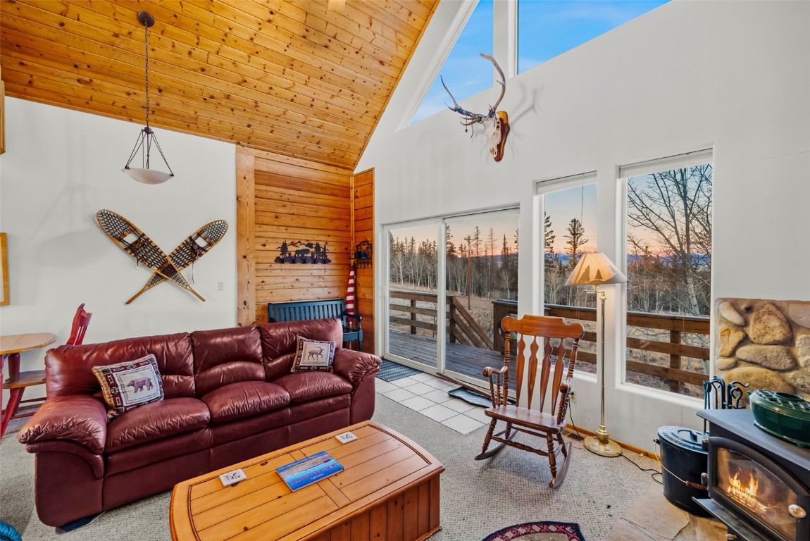 1026 Warpath Road Como, CO 80456 - Photo 9 of 45 a living room with furniture a rug and a window