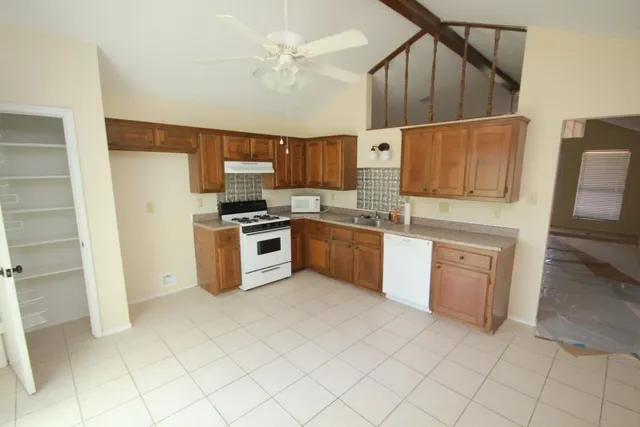 a view of a yard in front of the house