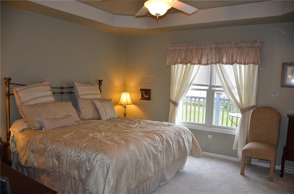 315 Quail Ridge Court Gibsonia, PA 15044 - Photo 11 of 25 The master bedroom features new carpeting, a trey ceiling, ceiling fan and tons of natural light.