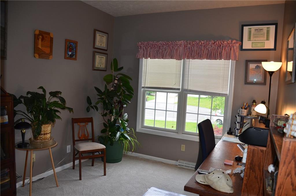 315 Quail Ridge Court Gibsonia, PA 15044 - Photo 17 of 25 Bedroom number three is currently used as an office space, has a ceiling fan and twin windows for tons of natural light.