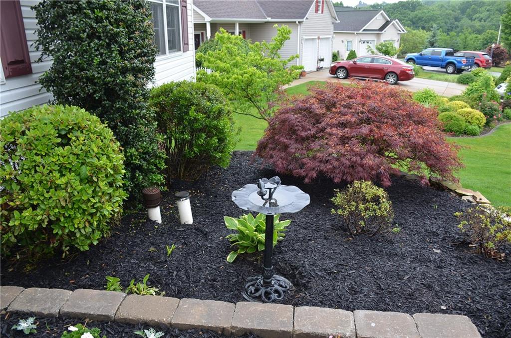 315 Quail Ridge Court Gibsonia, PA 15044 - Photo 23 of 25 The yard and landscaping, both front and rear, has a professional look and is meticulously maintained.
