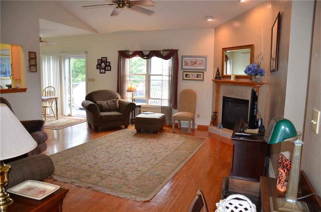 315 Quail Ridge Court Gibsonia, PA 15044 - Photo 6 of 25 The open floor plan also features a vaulted ceiling and ceiling fan.