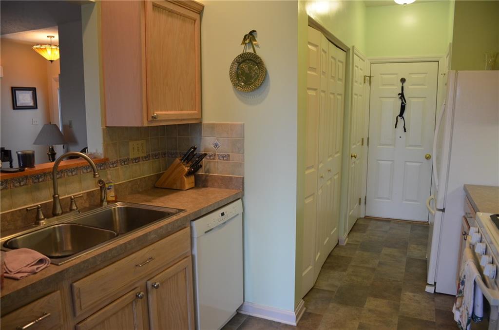 315 Quail Ridge Court Gibsonia, PA 15044 - Photo 9 of 25 The kitchen also features a pass through to the living room/great room for Pens games, Steeler games or any large gathering event.