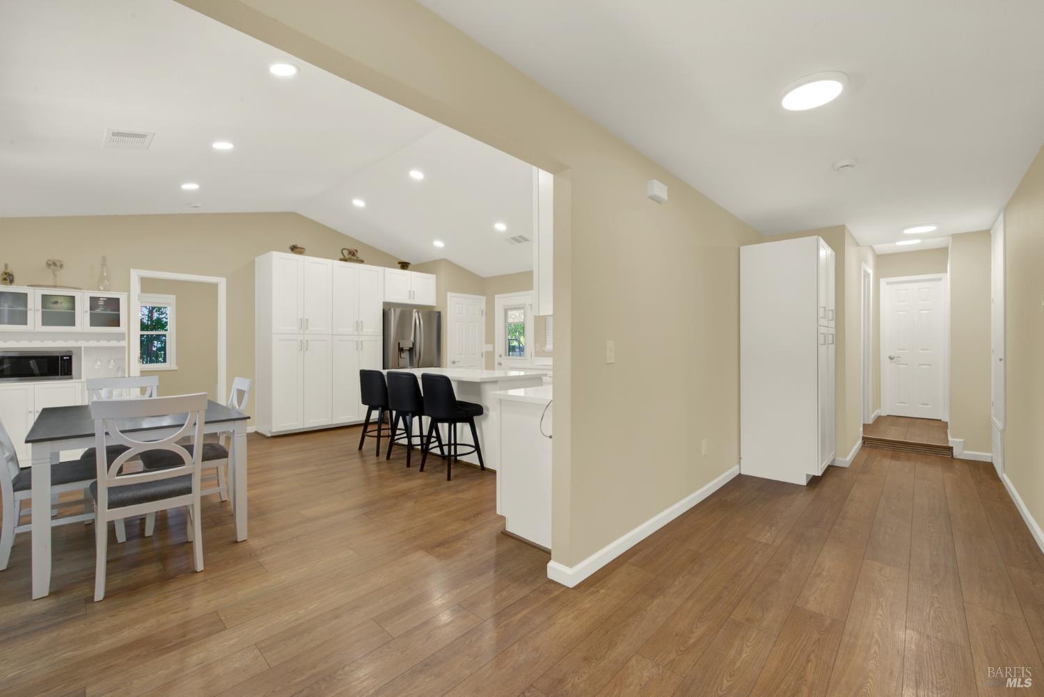 4851 Udell Road Vacaville, CA 95688 - Photo 7 of 65 a view of a dining room with furniture and wooden floor
